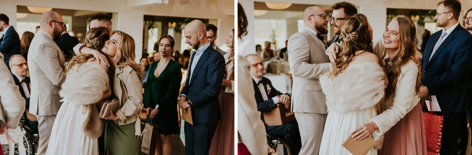 Goście weselni obejmują się podczas przyjęcia.